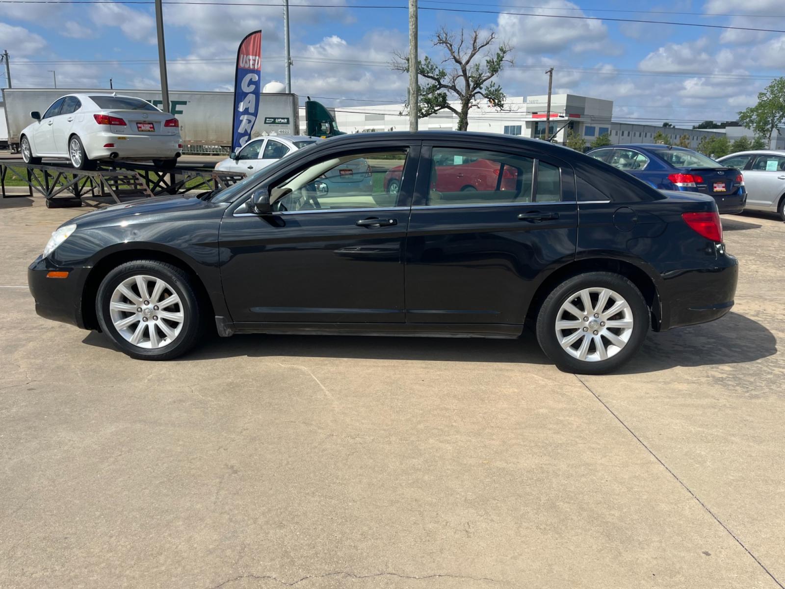 2010 Black /TAN Chrysler Sebring Sedan Limited (1C3CC5FB2AN) with an 2.4L L4 DOHC 16V engine, 4-Speed Automatic transmission, located at 14700 Tomball Parkway 249, Houston, TX, 77086, (281) 444-2200, 29.928619, -95.504074 - Photo #3